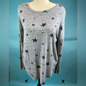 Soft grey long sleeve sweater with black stars